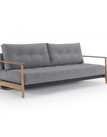 graues Klappsofa mit Holzbeinen mit Kissen