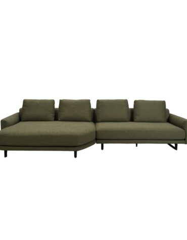 grünes Polstersofa mit Kissen