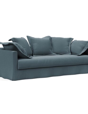 blaues Polster Sofa mit Kissen