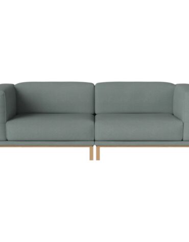 grünes Polstersofa mit Holzbeinen